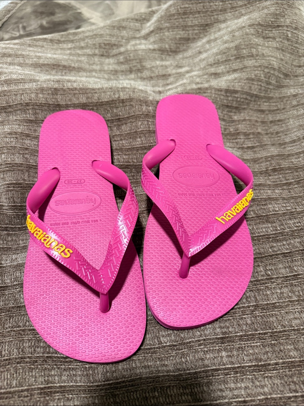 Havaianas Bright Pink Flip Flop Sandals with Yellow Logo